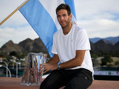Juan Martin del Potro, of Argentina, poses with his trophy after defeating Roger Federer, of Switzerland, during the men's final at the BNP Paribas Open tennis tournament, Sunday, March 18, 2018, in Indian Wells, Calif. Del Potro won 6-4, 6-7 (8), 7-6 (2). (AP Photo/Mark J. Terrill)
