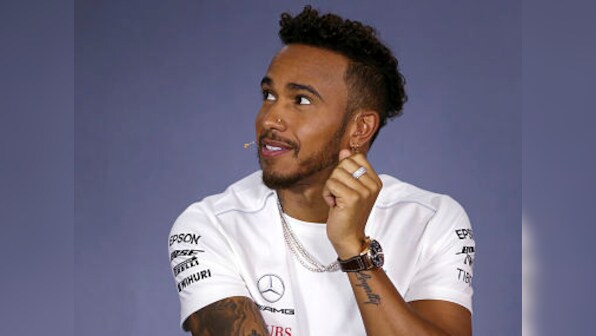 Formula One: Mercedes' Lewis Hamilton says Arsene Wenger invited him to train with Arsenal