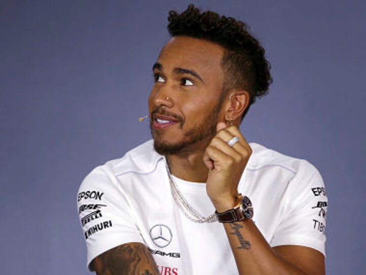 Formula One: Mercedes' Lewis Hamilton says Arsene Wenger invited him to train with Arsenal