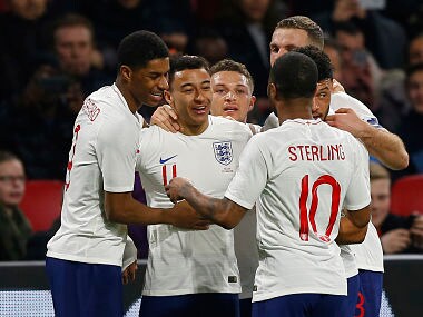 England's Jesse Lingard, second left, celebrates scoring his side's first goal during the international friendly soccer match between the Netherlands and England at the Amsterdam ArenA in Amsterdam, Netherlands, Friday, March 23, 2018. (AP Photo/Peter Dejong)