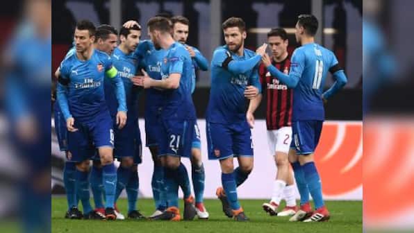 Europa League: Arsenal provide respite for Arsene Wenger with 2-0 win over AC Milan; Borussia Dortmund stunned