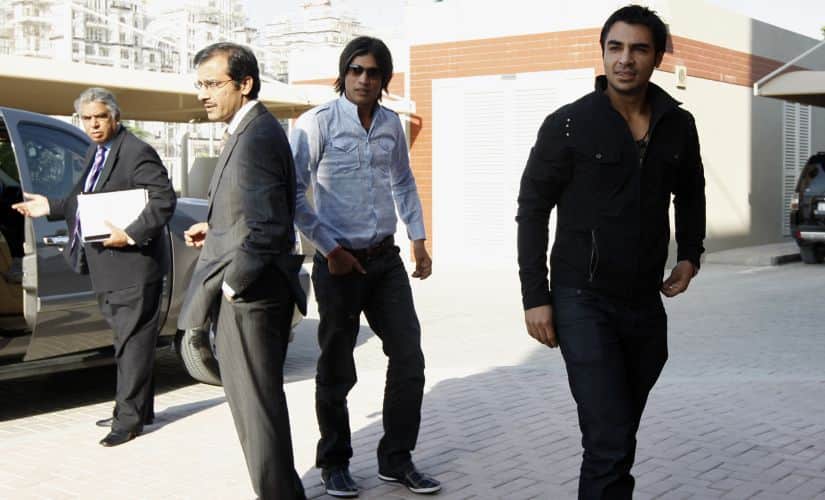 Pakistan cricket players Salman Butt (R) and Mohammad Amir (C) arrive for the second day of their hearing at the ICC headquarters in Dubai 31 October, 2010. Reuters