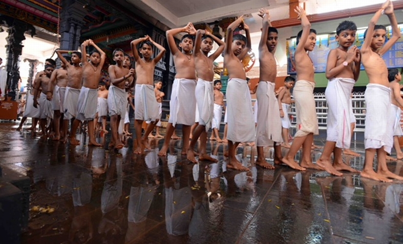 Kuthiyottam row: Young boys endure days of suffering, brave piercings with metal hooks in Kerala temple ritual Kuthiyottam row: Young boys endure days of suffering, brave piercings with metal hooks in Kerala temple ritual