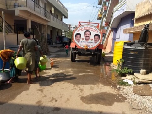 Now, Karnataka voters get free water as BJP, Congress rush to capitalise on scarcity in parched Bengaluru villages Now, Karnataka voters get free water as BJP, Congress rush to capitalise on scarcity in parched Bengaluru villages