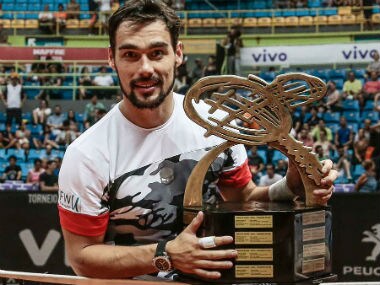 Italy's Fabio Fognini poses with the Brazil Open trophy. Twitter: @ATPWorld