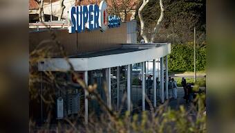 France to pay national tribute to police officer who offered himself for hostage during attack at supermarket