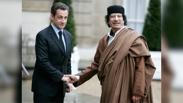 Ex-French president Nicolas Sarkozy held over claims that he received campaign funding from Muammar Gaddafi