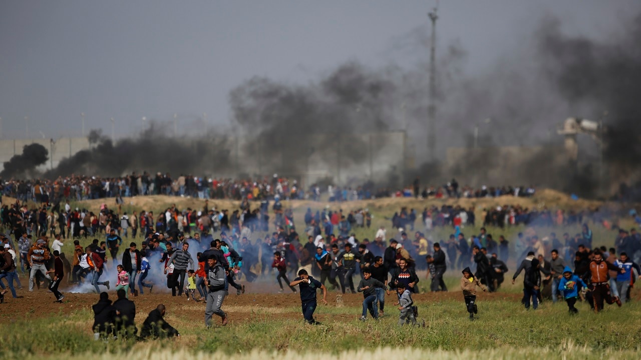 16 dead as clashes erupt near Gaza-Israel border; protesters hurt by ...