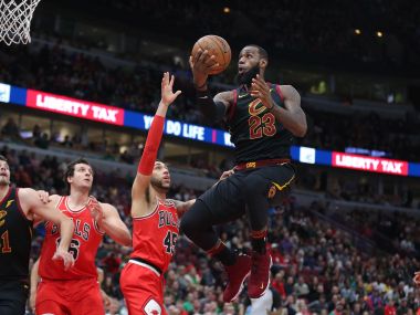 LeBron James (23) shoots over Chicago Bulls forward Denzel Valentine (45) during their game. Reuters