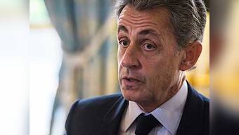 Nicolas Sarkozy in custody for Libyan campaign funding probe, French ex-president calls allegations 'grotesque'