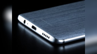 OnePlus 6 leaked online showing off a wood-textured back, 3.5 mm audio jack and USB Type C port