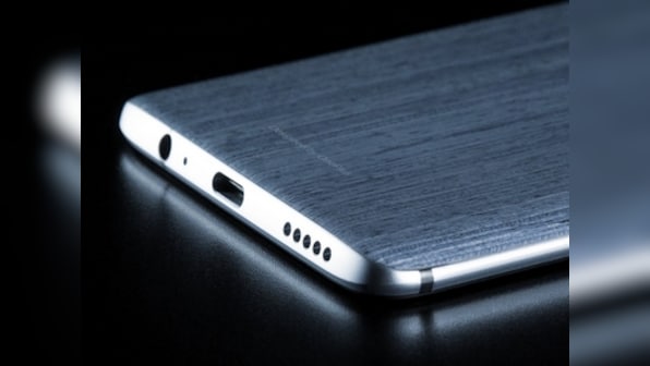 OnePlus 6 leaked online showing off a wood-textured back, 3.5 mm audio jack and USB Type C port