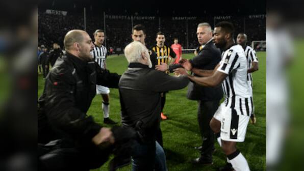 Gun-toting PAOK president Ivan Savvides faces disciplinary charges as FIFA warns Greece to take immediate action