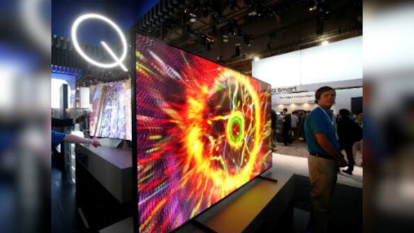 Samsung's new Bixby-powered QLED TVs can turn invisible when not in use