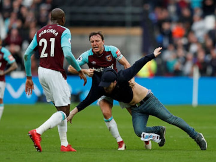 Premier League: FA to probe West Ham after fans invade pitch during loss to Burnley