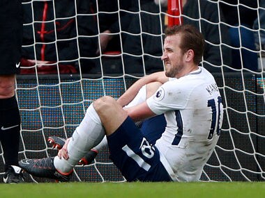 Soccer Football - Premier League - AFC Bournemouth vs Tottenham Hotspur - Vitality Stadium, Bournemouth, Britain - March 11, 2018 Tottenham's Harry Kane sustains an injury after scoring a disallowed goal REUTERS/Ian Walton EDITORIAL USE ONLY. No use with unauthorized audio, video, data, fixture lists, club/league logos or "live" services. Online in-match use limited to 75 images, no video emulation. No use in betting, games or single club/league/player publications. Please contact your account representative for further details. - RC185917AE70