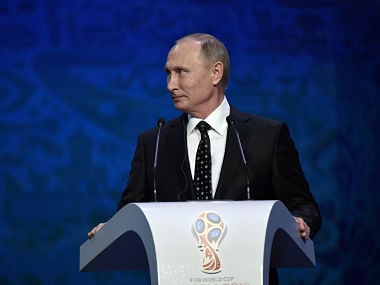 Soccer Football - 2018 FIFA World Cup Draw - State Kremlin Palace, Moscow, Russia - December 1, 2017. President of Russia Vladimir Putin is seen during the draw. Sputnik/Alexey Nikolsky/Kremlin via REUTERS ATTENTION EDITORS - THIS IMAGE WAS PROVIDED BY A THIRD PARTY. - RC13879D05F0