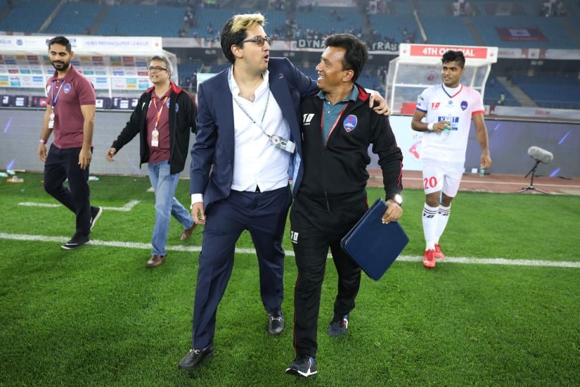 Rohan Sharma, director of Delhi Dynamos FC and Shakti Chauhan, Assistant Coach, celebrate their win against ATK in the Indian Super League. Image courtesy: Delhi Dynamos
