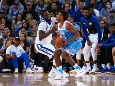 Sacramento Kings guard Buddy Hield looks to shoot the ball against Golden State Warriors. Reuters