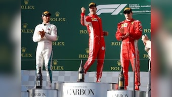 Australian Grand Prix: Sebastian Vettel holds off Lewis Hamilton to win thrilling opening race of 2018 season