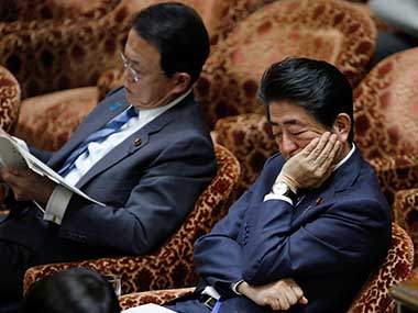 References to Japan's PM Shinzo Abe, his wife Akie and FM Taro Aso removed from documents related to suspected scandal References to Japan's PM Shinzo Abe, his wife Akie and FM Taro Aso removed from documents related to suspected scandal