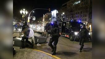 Spain unrest: Clashes erupt between Catalan separatists, police after Carles Puigdemont's arrest in Germany