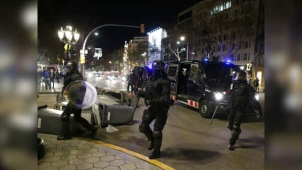Spain unrest: Clashes erupt between Catalan separatists, police after Carles Puigdemont's arrest in Germany