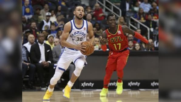 NBA: Stephen Curry tweaks ankle in Warriors' win over Hawks; Raptors sink Wizards on the road