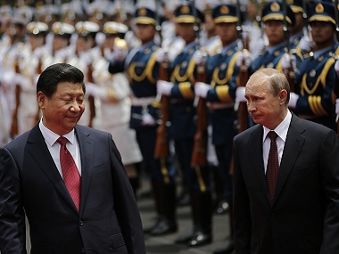 The politics of Vladimir Putin and Xi Jinping: Autocrat presidents for life who may lead Russia and China down a similar road The politics of Vladimir Putin and Xi Jinping: Autocrat presidents for life who may lead Russia and China down a similar road