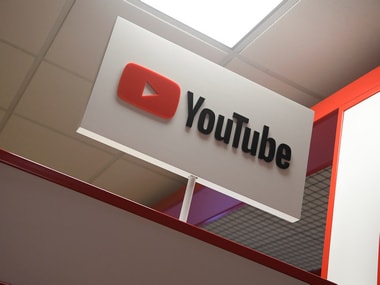 Signage is seen at a YouTube stand. Reuters