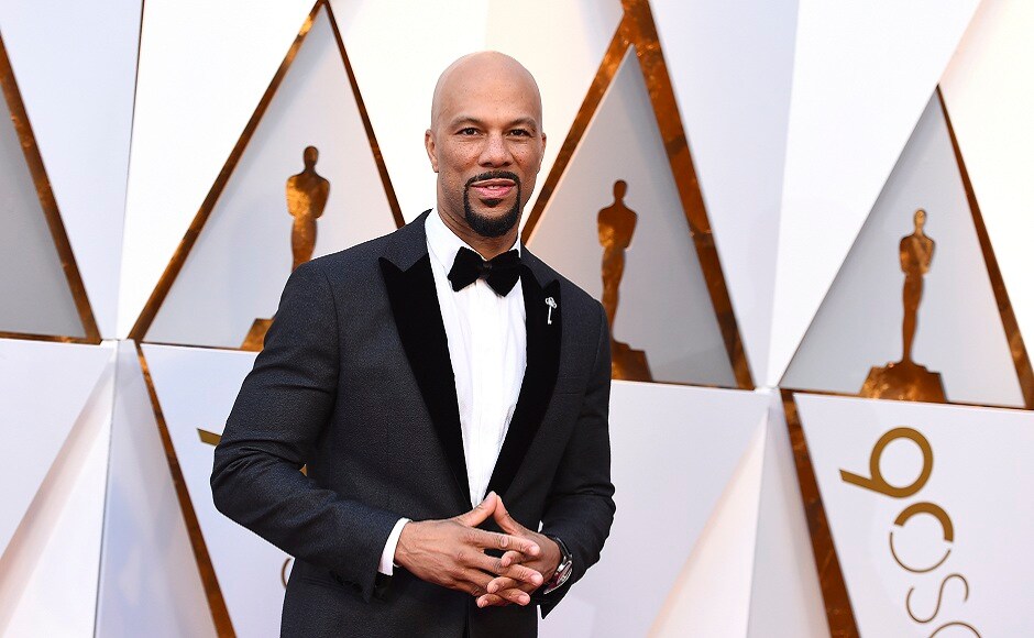 Common's Armani suit was as sharp as his performance of 'Stand Up For Something' later in the evening. AP Photo