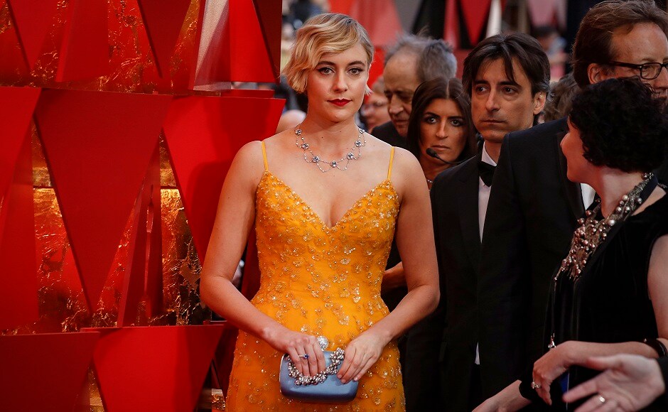 Ladybird director Greta Gerwig looked dreamy in a yellow Rodarte number, with Tiffany & Co jewels. REUTERS