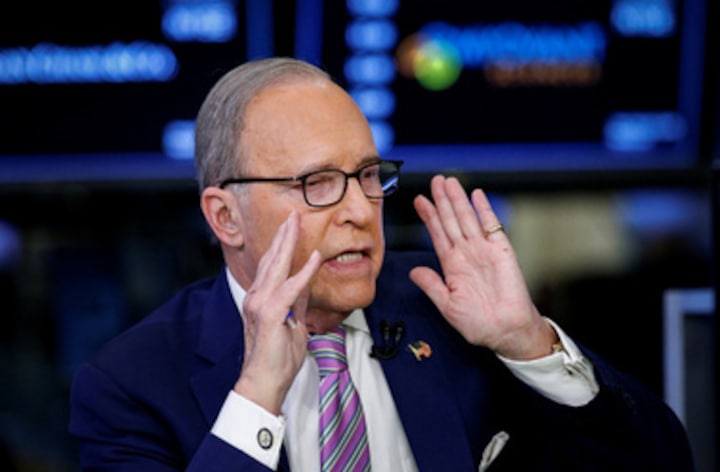 Trump picks camera-proven Kudlow as top economic aide