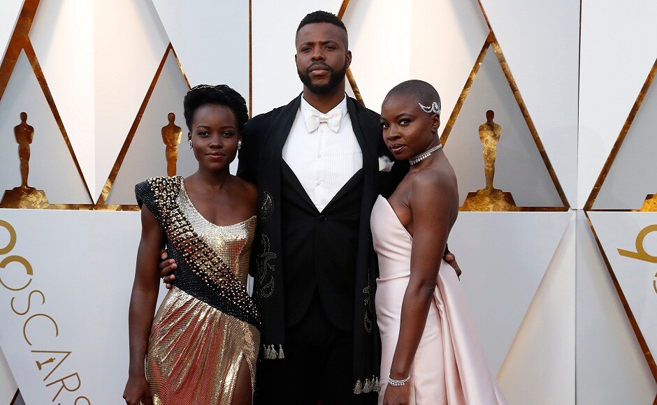 Lupita Nyong'o stunned in Versace, Winston Duke in an Etro tux, and Danai Gurira in Gabriela Hearst. REUTERS