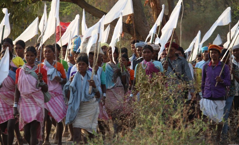 Chhattisgarh tribals marching in protest of non-implementation of FRA and seeking basic amenities in tribal villages. Image Courtesy: Survival India NGO