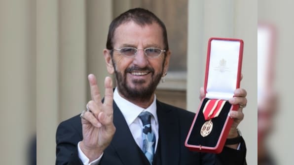Ringo Starr becomes second member of The Beatles to receive knighthood; says 'I'll wear it at breakfast'