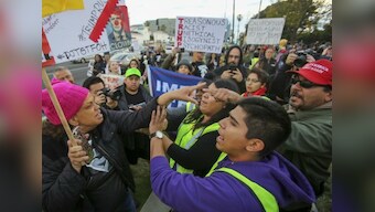 Donald Trump's visit to Mexico border marred by demonstrators protesting his plans for 'big, beautiful' wall