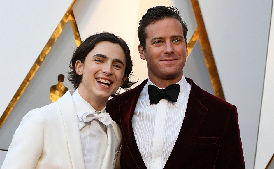 Actor Timothée Chalamet, left, and Actor Armie Hammer arrive for the 90th Annual Academy Awards on March 4, 2018, in Hollywood, California. / AFP PHOTO / VALERIE MACON