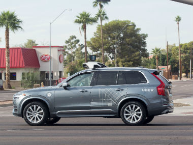 Uber's self-driving car kills a pedestrian in Arizona who was crossing the road Uber's self-driving car kills a pedestrian in Arizona who was crossing the road