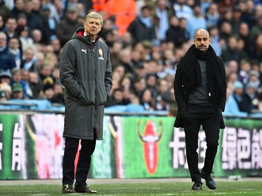 Manchester City's Spanish manager Pep Guardiola (R) and Arsenal's French manager Arsene Wenger (L) watch from the touchline during the English League Cup final football match between Manchester City and Arsenal at Wembley stadium in north London on February 25, 2018. / AFP PHOTO / Glyn KIRK / RESTRICTED TO EDITORIAL USE. No use with unauthorized audio, video, data, fixture lists, club/league logos or 'live' services. Online in-match use limited to 75 images, no video emulation. No use in betting, games or single club/league/player publications. /