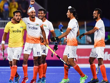 Indian men’s hockey team celebrating a goal against England. AFP