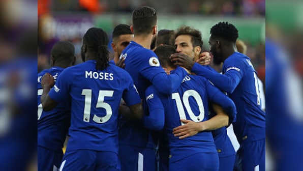 Premier League: Chelsea beat Swansea to keep Champions League hopes alive; Liverpool draw against Stoke City