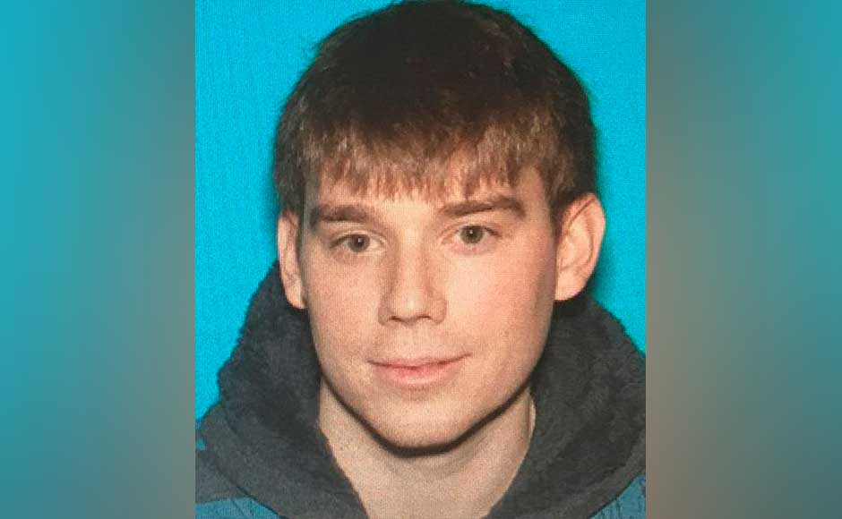 Police identified the suspect as 29-year-old Travis Reinking and said he could be armed with a rifle and a handgun, after firing an AR-15 semi-automatic rifle at the restaurant, where he was nude except for a green jacket. A military-style weapon, the AR-15 has been regularly used in US mass shootings. AP Police identified the suspect as 29-year-old Travis Reinking and said he could be armed with a rifle and a handgun, after firing an AR-15 semi-automatic rifle at the restaurant, where he was nude except for a green jacket. A military-style weapon, the AR-15 has been regularly used in US mass shootings. AP