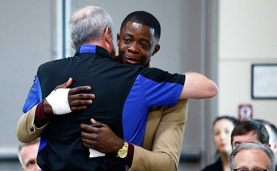 As the shooter was either reloading or the weapon jammed, Shaw ran and hit him with the swivel door, leading to a scuffle. Police said they believe the gunman discarded the jacket while fleeing to his home, where he put on a pair of pants and then disappeared into nearby woods. James Shaw, right, gets a hug from Waffle House CEO Walt Ehmer. AP As the shooter was either reloading or the weapon jammed, Shaw ran and hit him with the swivel door, leading to a scuffle. Police said they believe the gunman discarded the jacket while fleeing to his home, where he put on a pair of pants and then disappeared into nearby woods. James Shaw, right, gets a hug from Waffle House CEO Walt Ehmer. AP