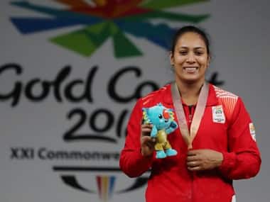 Punam Yadav poses with her weightlifting gold. AP