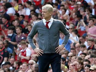 Arsenal's Arsene Wenger watches the English Premier League soccer match against West Ham United at the Emirates Stadium, London, Sunday April 22, 2018. (Mark Kerton/PA via AP)