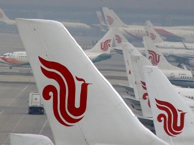 Armed with fountain pen, Air China passenger attempts to hold flight attendant hostage; plane diverted
