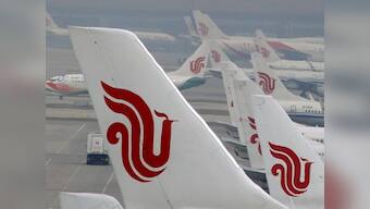 Armed with fountain pen, Air China passenger attempts to hold flight attendant hostage; plane diverted