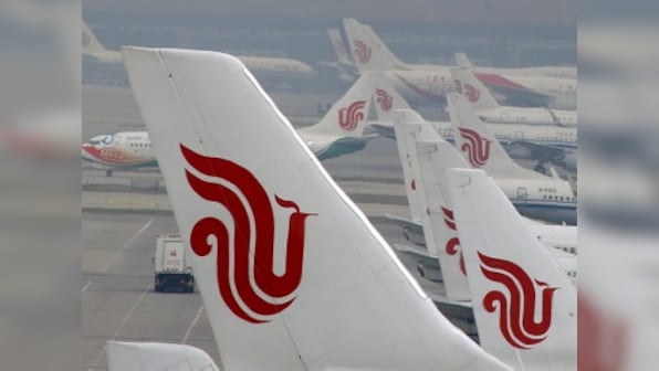 Armed with fountain pen, Air China passenger attempts to hold flight attendant hostage; plane diverted