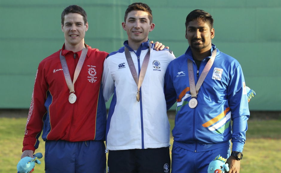 Tim Kneale of the Isle of Man (L) silver, David McMath of Scotland (C) gold medal, and bronze medallist Ankur Mittal of India, (R) pose during the award ceremony for the men's double trap final at the Belmont Shooting Centre at the 2018 Commonwealth Games. AP Tim Kneale of the Isle of Man (L) silver, David McMath of Scotland (C) gold medal, and bronze medallist Ankur Mittal of India, (R) pose during the award ceremony for the men's double trap final at the Belmont Shooting Centre at the 2018 Commonwealth Games. AP